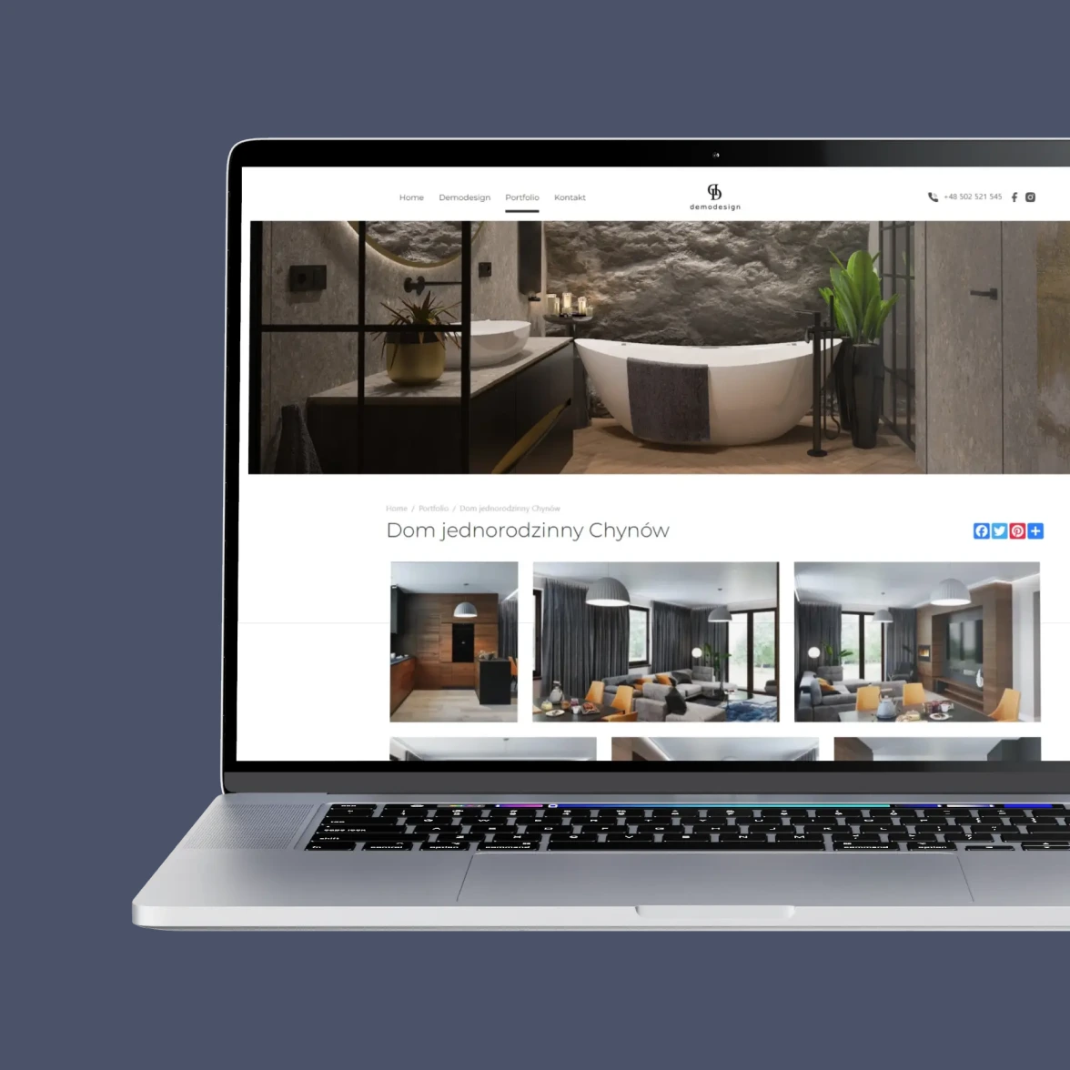 Laptop with displayed website demodesign.eu